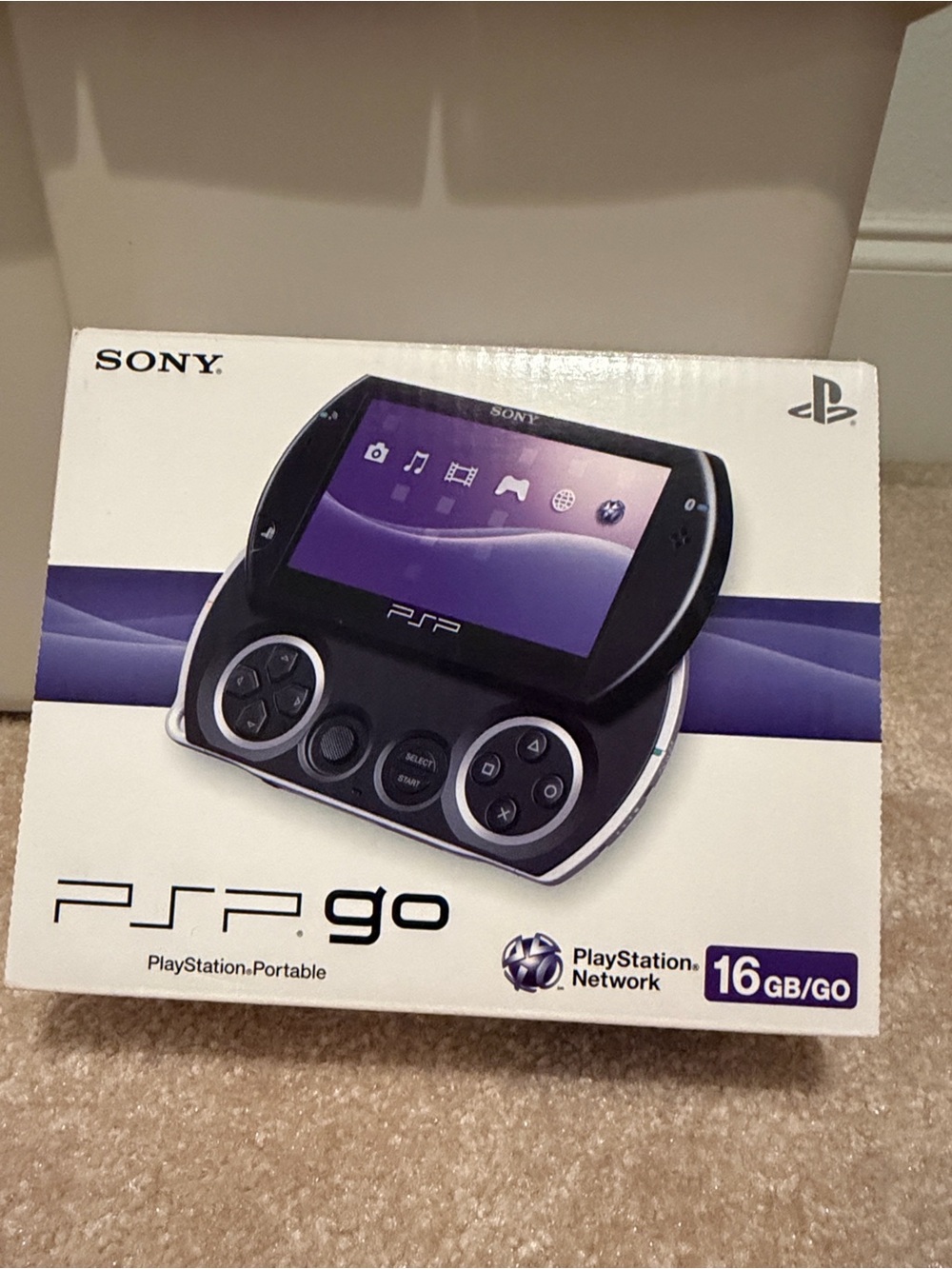 Sony PSP Go Portable Gaming System in Black and Purple